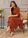 Rust Kurta Editorial Portrait.webp